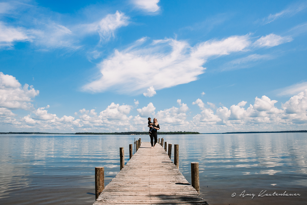 Mom and Boy on the Dock at Norway Beach Resort on Cass Lake, MN